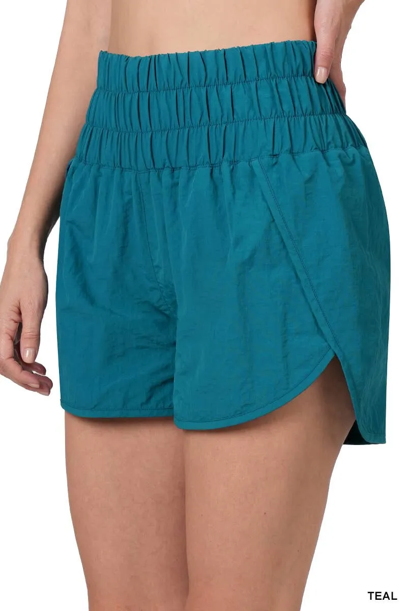 Errands To Run High Waist Windbreaker Short in Teal